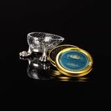 Jan Stenbecks ikoniska Caviarägg tillsammans med caviarburk – ett tidlöst designföremål i glas och tenn.