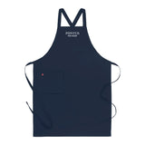 Kockförkläde i marinblå twill med Pontus Frithiof-logotyp, visad framifrån.